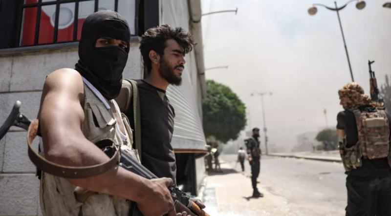 Clashes, homes torched in south Syria's Sweida despite ceasefire