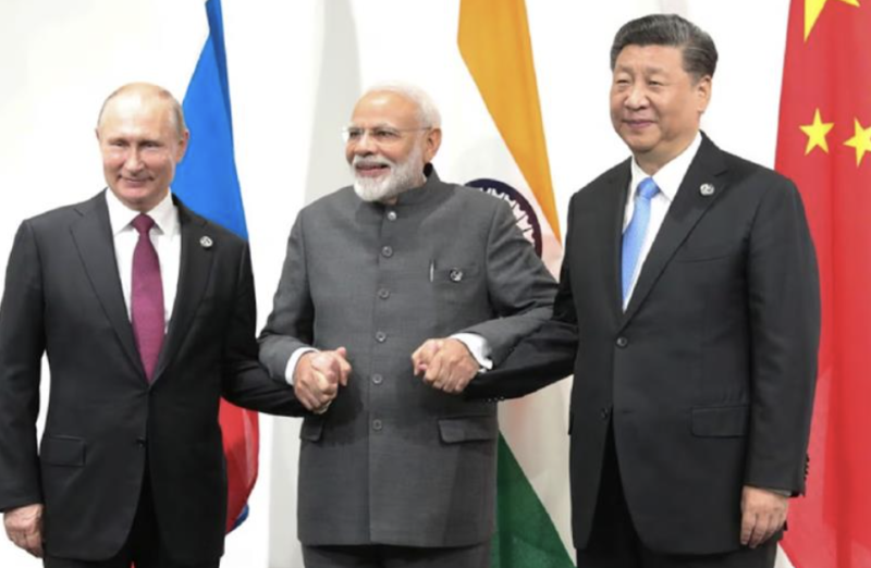 Putin and Modi in China for summit hosted by Xi