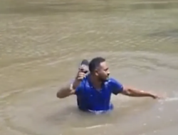 Journalist gets shocked while filming in a river in Brazil, here's what happened