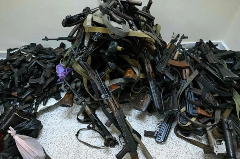 ‘We’re all Syrians’: Soldiers hand in weapons, hope for quiet lives