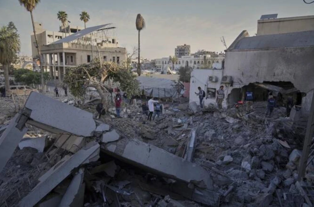 Israeli airstrike hits hospital entrance in Gaza, killing medic and wounding 9 other people