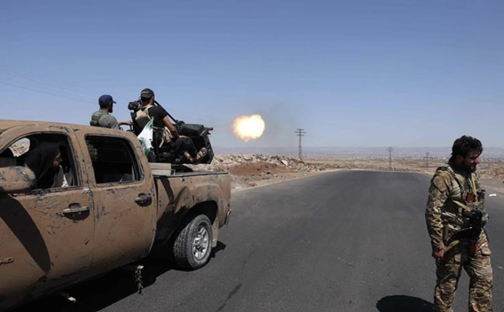 Almost 100 killed as Syria sectarian clashes rage