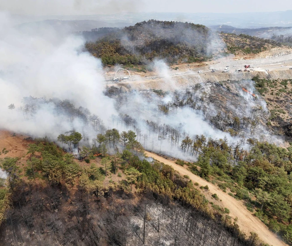 Firefighters battle wildfires in Turkey