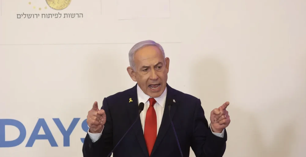 نتنياهو يتوعد بـ"تدمير المحور الإيراني"