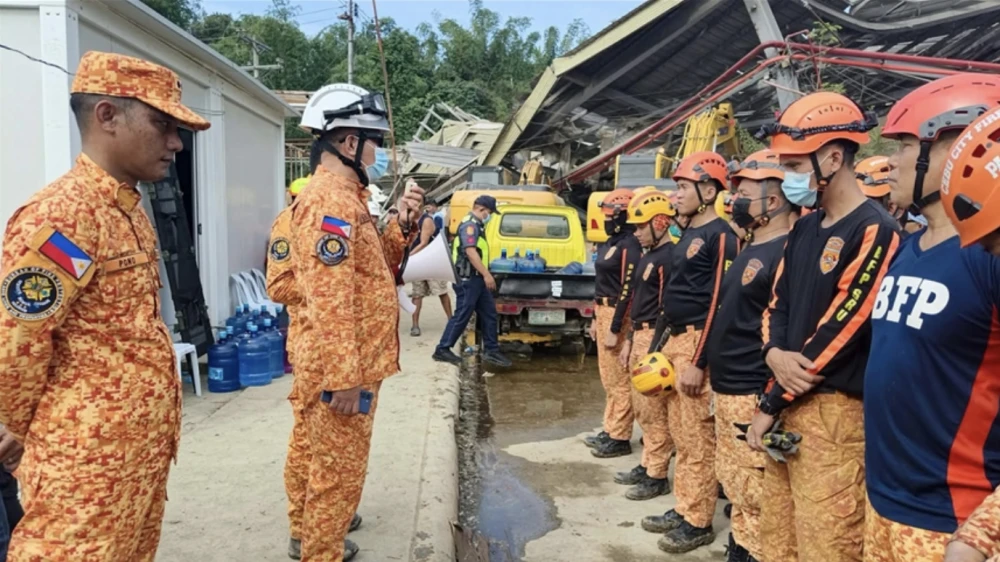 Death toll in Philippines landfill collapse rises to 4, search continues for dozens still trapped