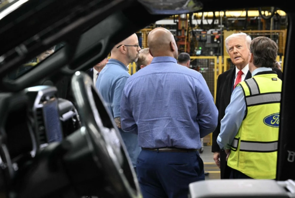 Ford worker suspended after intense exchange with Trump